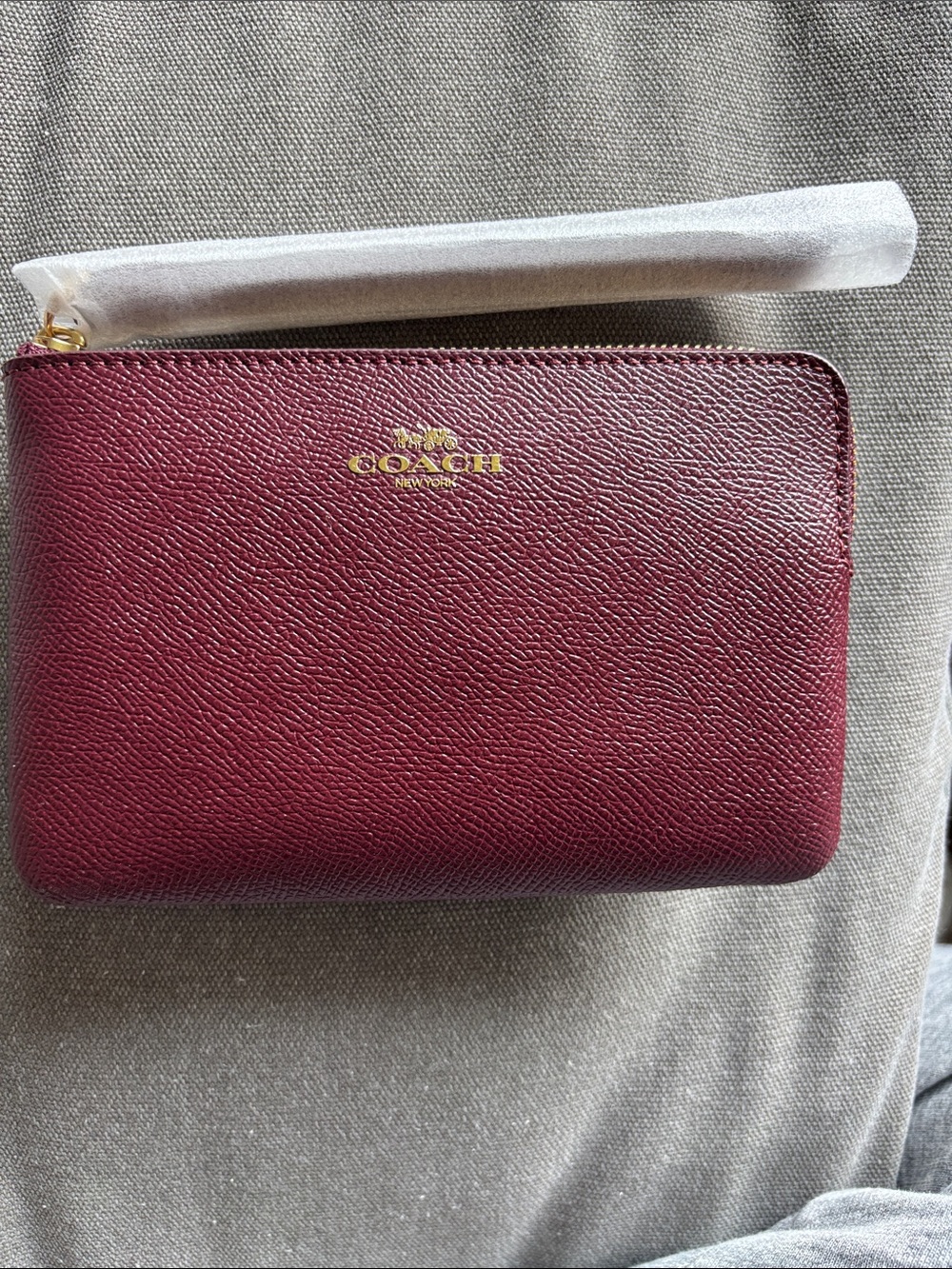 Coach Burgundy Pebbled Leather Zip Wristlet with Gold Logo